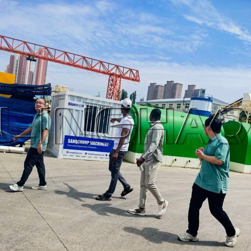 SOGETRA clients from Burkina Faso touring LINGHAO factory production workshop
